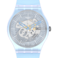 Swatch Swiss automatic watch with a translucent light blue resin case and strap, featuring a skeleton dial with visible gears and blue hands, set against a solid green background.