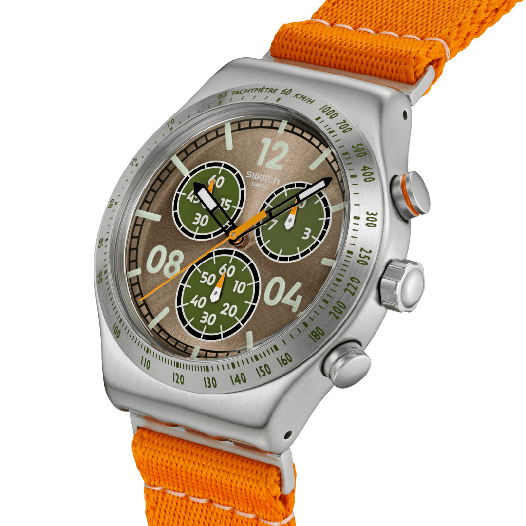 Wristwatch with orange strap and detailed face on a white background